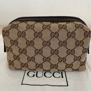 Gucci Supreme Monogram Cosmetic Pouch Brown Unisex ID,Code EUC